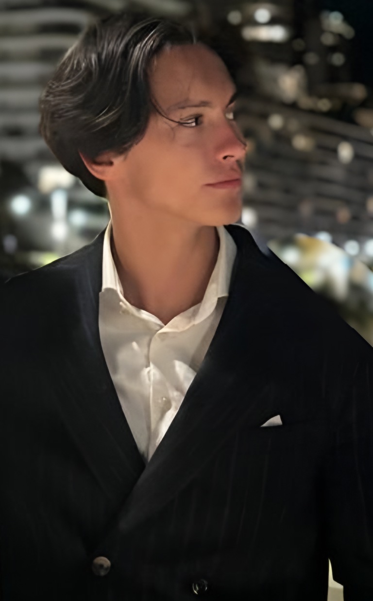 Sondre Franco Grimen in a dark pinstripe suit